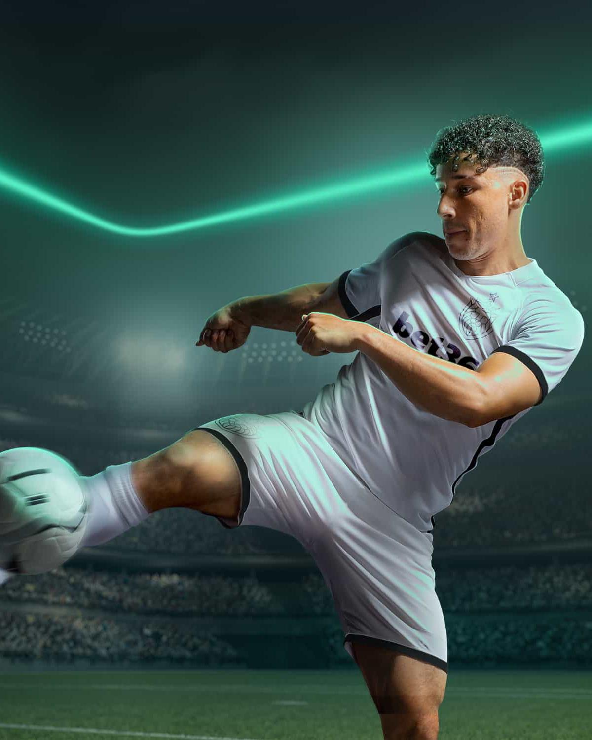 Football player kicking the ball